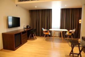 TV/Unterhaltungsangebot in der Unterkunft Native INN By Heda Hospitality