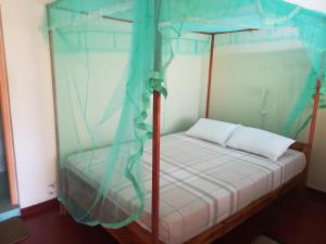 Een bed of bedden in een kamer bij Star beach hotel
