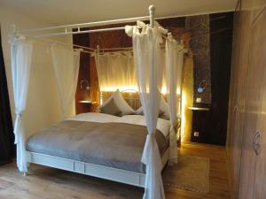 En eller flere senge i et værelse på Casa Shania