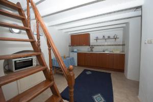 Dapur atau dapur kecil di Kaitoula Apartment Up