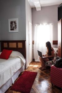 Cama ou camas em um quarto em Hostal Boonen