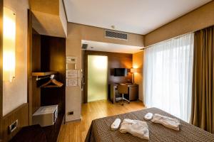 TV o dispositivi per l'intrattenimento presso Nafs Hotel