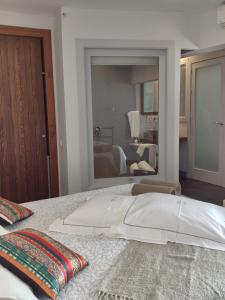 A bed or beds in a room at Hotel Los Patios - Parque Natural