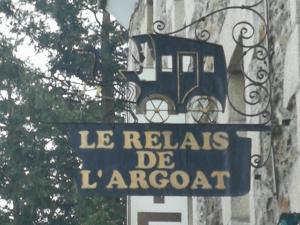 a sign that says le relais de larcord at Le relais de l'Argoat in Belle-Isle-en-Terre