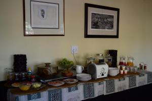 a table with a counter top with food on it at Savanna Guest Farm in Grünau +43 photos