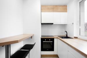 Kuchyňa alebo kuchynka v ubytovaní Sea Point Apartment - Hav Aparts