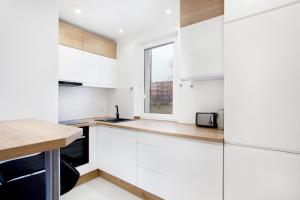 Kuchyňa alebo kuchynka v ubytovaní Sea Point Apartment - Hav Aparts