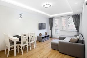 Televízia a/alebo spoločenská miestnosť v ubytovaní Sea Point Apartment - Hav Aparts