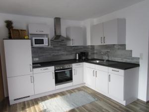 Kuchyňa alebo kuchynka v ubytovaní Ferienwohnung Huber