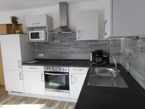 Kuchyňa alebo kuchynka v ubytovaní Ferienwohnung Huber