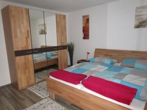 Posteľ alebo postele v izbe v ubytovaní Ferienwohnung Huber