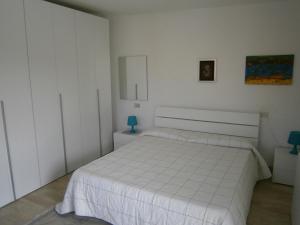 En eller flere senge i et værelse på La Finestra sul Cielo