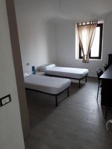 Кровать или кровати в номере Porta Maia