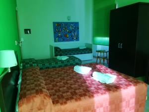 Postel nebo postele na pokoji v ubytování Hotel I Colori
