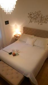 A bed or beds in a room at Affittacamere I Gatti delle 5 Terre