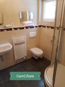 Ένα μπάνιο στο Haus Olympia