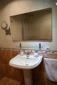 Koupelna v ubytování Apartamento Plaza Alfonso XII
