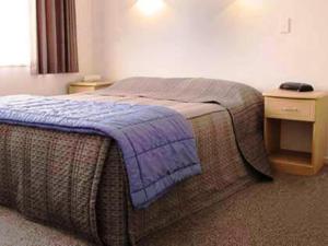 Postel nebo postele na pokoji v ubytování Riverview Motel