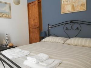 Voodi või voodid majutusasutuse Agriturismo Salento D'Arare toas