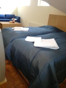 En eller flere senge i et værelse på Private studio in a hotel complex, central in Bansko