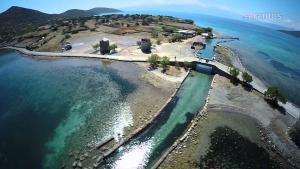 an aerial view of an island in the ocean at Traditional House in Elounda in Elounda