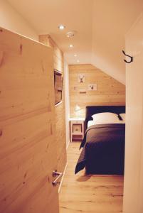 Кровать или кровати в номере Chalet am Hasselkopf