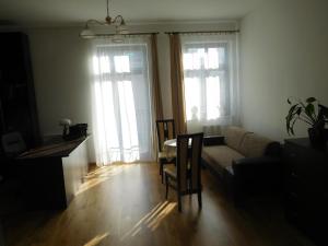 Posedenie v ubytovaní Apartament DERUBEIS