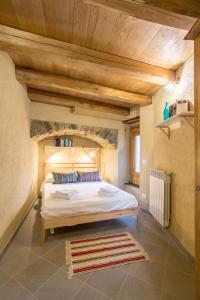 Cama ou camas em um quarto em Villa Amamòse
