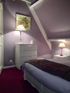 Postel nebo postele na pokoji v ubytování Le Cottage Mirabelle