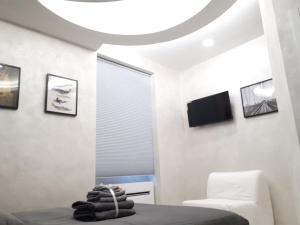 Televízia a/alebo spoločenská miestnosť v ubytovaní Silver house