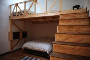 Cama ou camas em um quarto em Eco-Hostal Tambo Verde