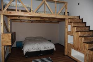 Cama ou camas em um quarto em Eco-Hostal Tambo Verde