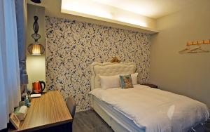 Letto o letti in una camera di Mori Inn