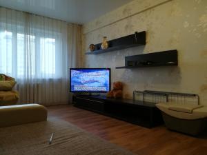 En TV eller et underholdningssystem på Apartament 32 micro-distrit 5/4