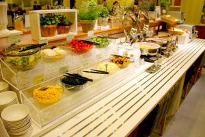 a buffet line with a lot of food at Smile Hotel Tokyo Shinkoiwa in Tokyo