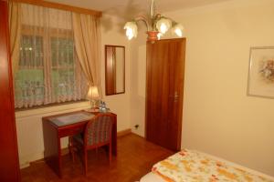 Postel nebo postele na pokoji v ubytování Apartment Heidelinde