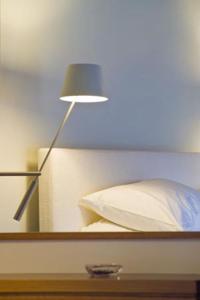 Posteľ alebo postele v izbe v ubytovaní Enastron Guesthouse