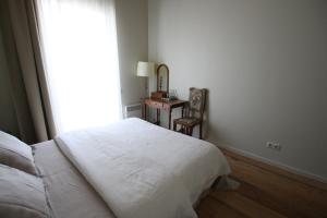 Postel nebo postele na pokoji v ubytování Meke