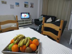 TV a/nebo společenská místnost v ubytování Adonis Apartment