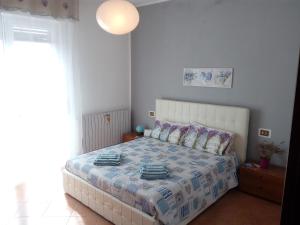 Postel nebo postele na pokoji v ubytování Como Ricky Apartment