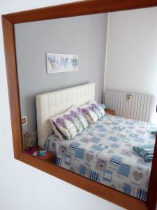 Postel nebo postele na pokoji v ubytování Como Ricky Apartment