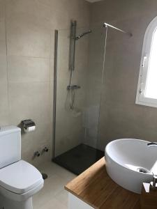 Kúpeľňa v ubytovaní Adosado en residencial