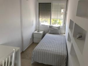 Posteľ alebo postele v izbe v ubytovaní Adosado en residencial