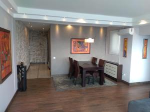 Genex Apartment的休息区