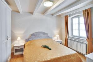 Posteľ alebo postele v izbe v ubytovaní Casa Meloni