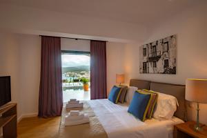 Posteľ alebo postele v izbe v ubytovaní North Point Houses