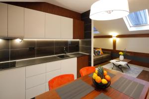 Kuchyň nebo kuchyňský kout v ubytování Hotel Passpartù Home Garni