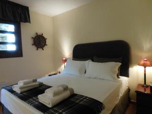 A bed or beds in a room at Anna's Mansion