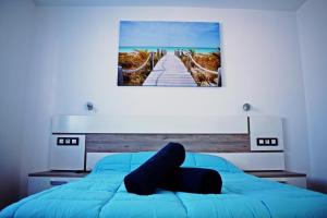 Posteľ alebo postele v izbe v ubytovaní Sun and Relax (San valentin)