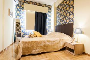 Postel nebo postele na pokoji v ubytování Private Central View rooms in Shared apartment near to Acropolis Metro Station